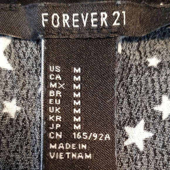Forever 21 Women's Black Top with White Stars - Picture 9 of 9